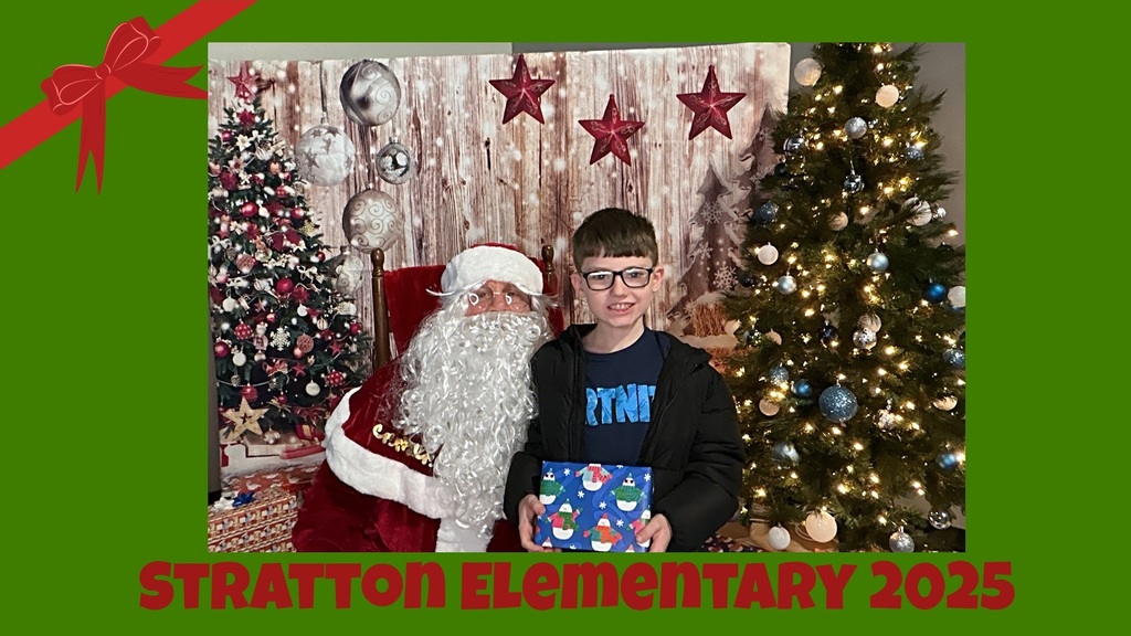 Stratton Elementary Christmas Party 2025 Picture of Student and Santa
