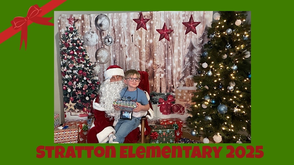Stratton Elementary Christmas Party 2025 Picture of Student and Santa