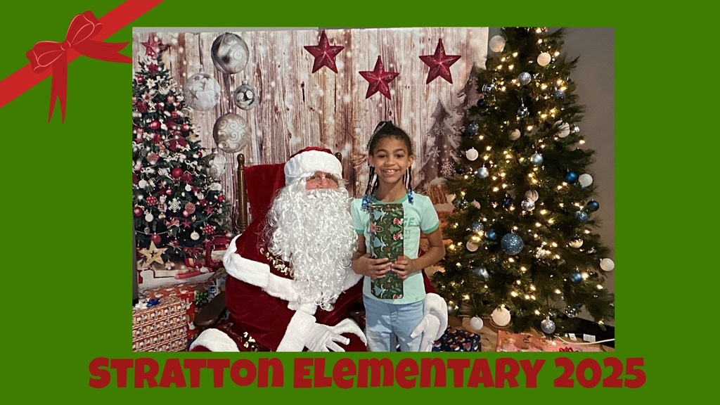 Stratton Elementary Christmas Party 2025 Picture of Student and Santa