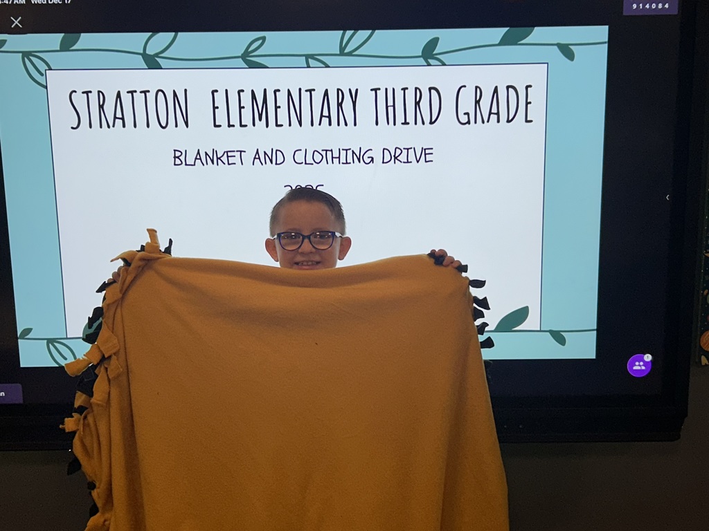 Mz. Inman's 3rd grade students with their no sew blankets they made