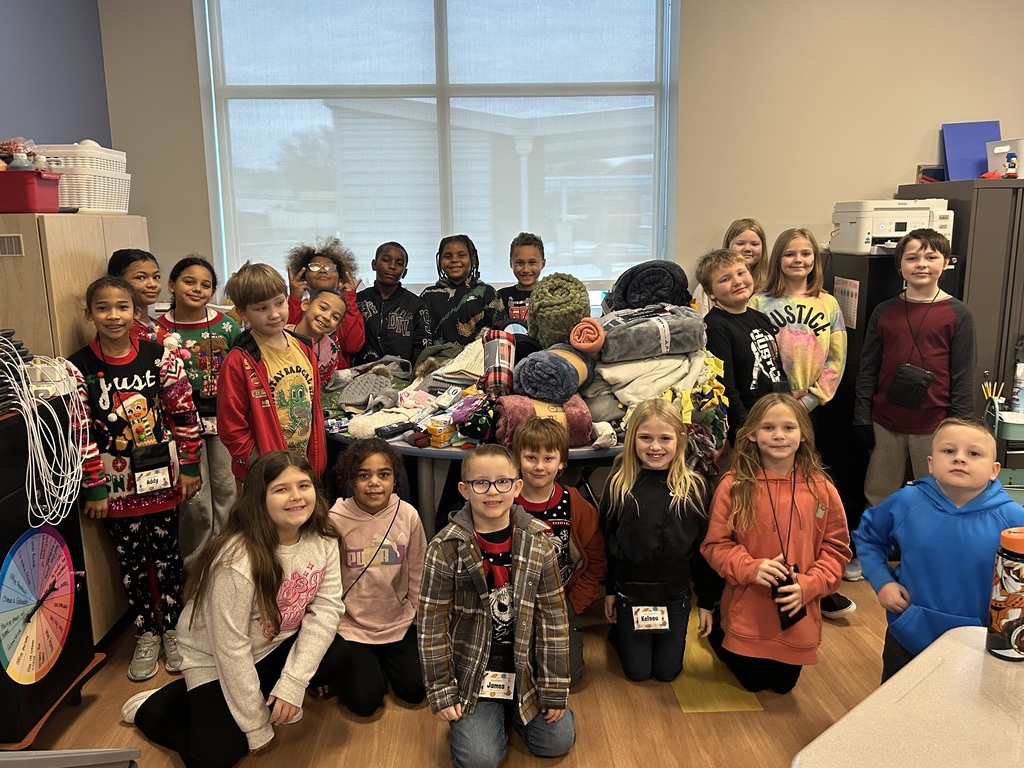 Mz. Inman's 3rd grade students with their blanket drive donations