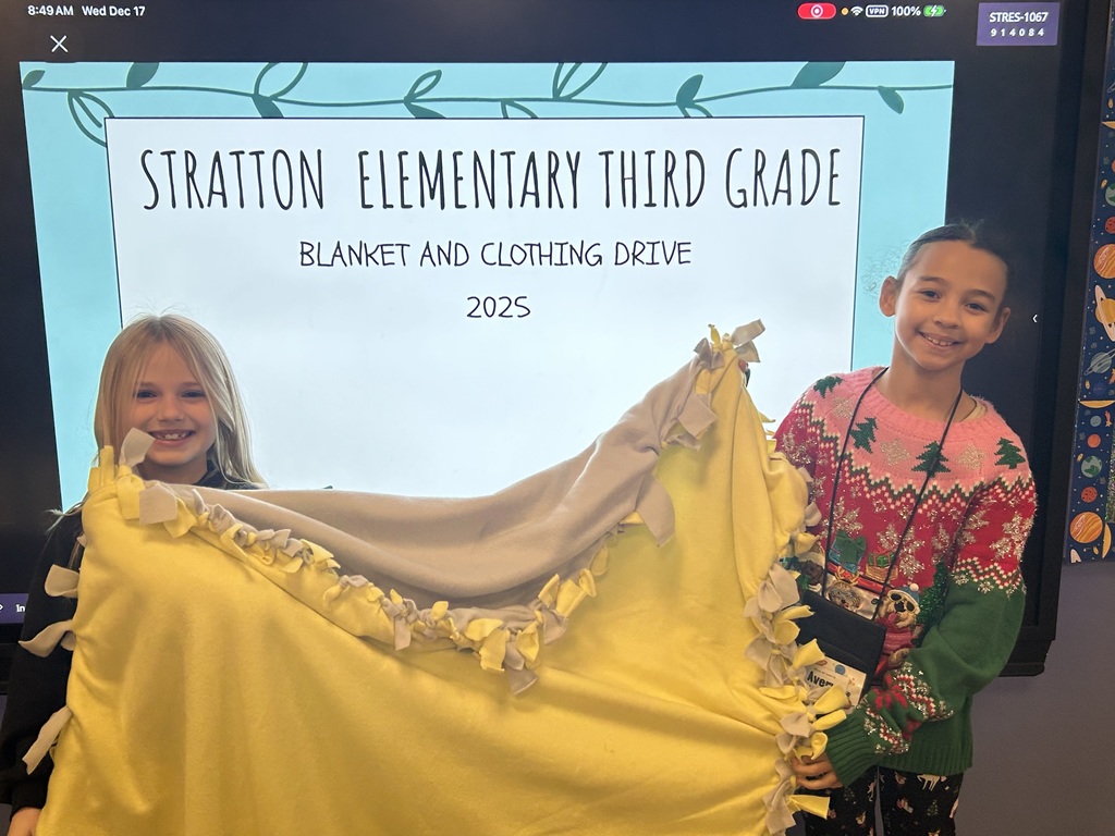 Mz. Inman's 3rd grade students with their no sew blankets they made