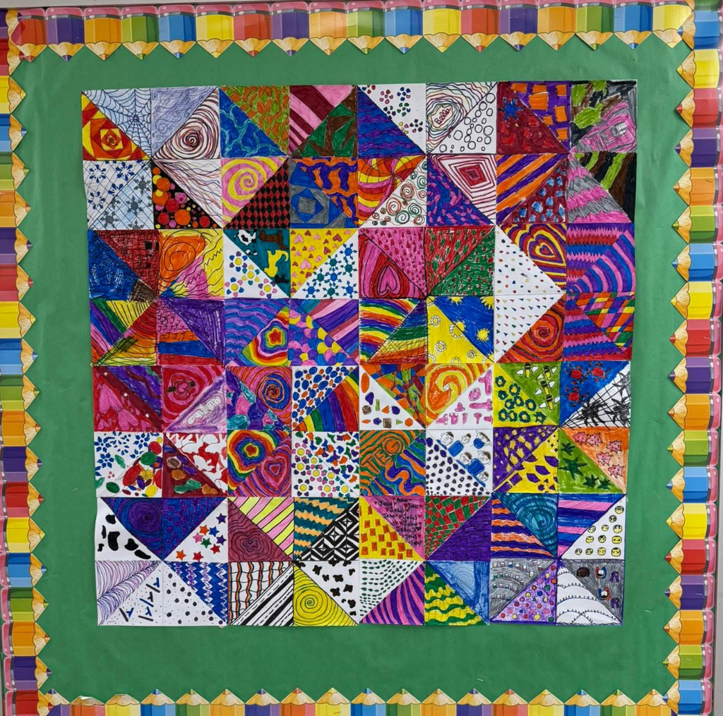 7th grade artwork displayed on our hall bulletin board 