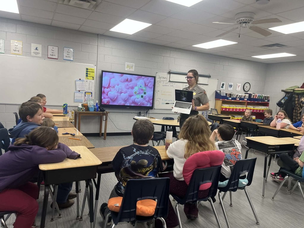 Park Ranger Megan is teaching our Cubs about mining coal. They used different ingredients to make the different layers or ground that surrounds coal.