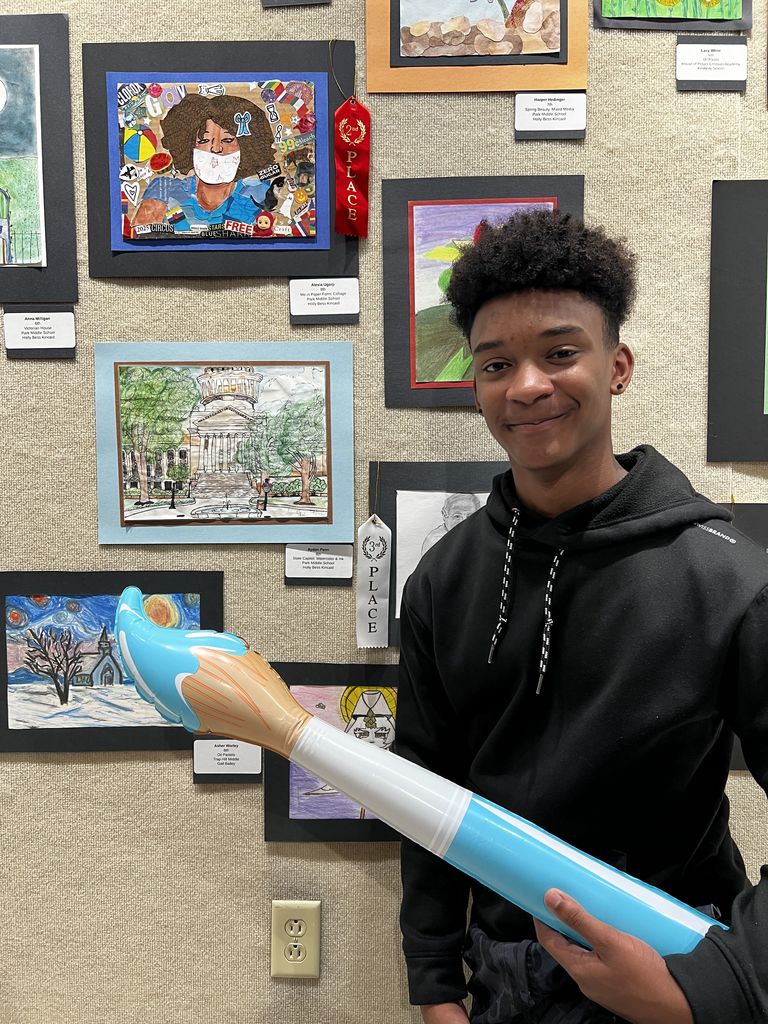 Photos of Youth Art Month Show entries and students