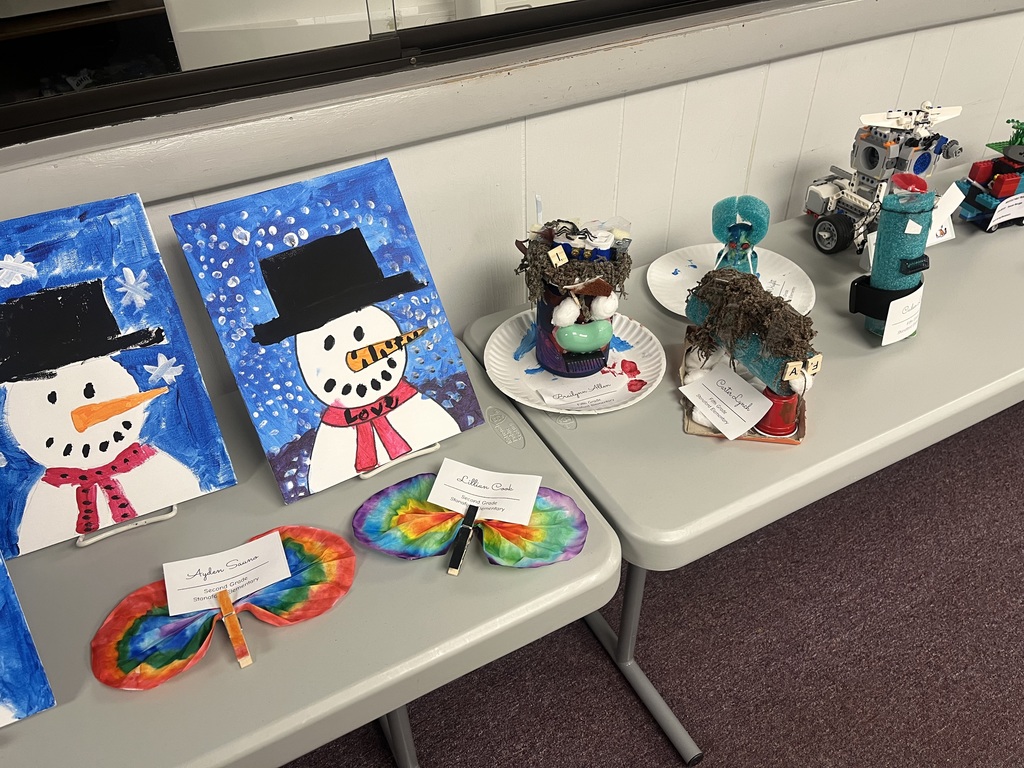 Stanaford student art from Night of the Arts, April 13th at Board of Education. Two snowmen paintings and two butterflies plus student models created with help from ArtCart.