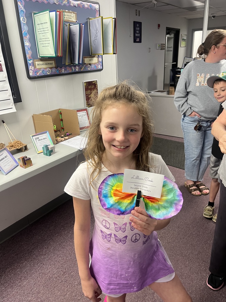 Lillian C showcasing her butterfly at Night of the Arts.