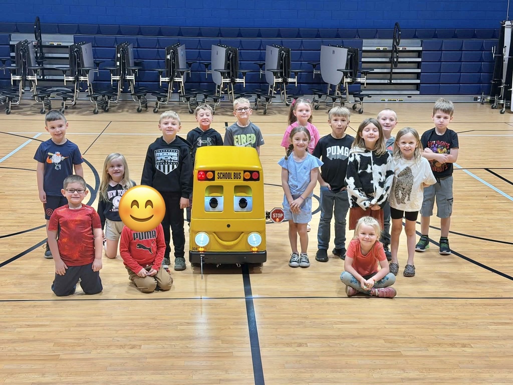 Kindergarten Students with Barney the Bus. 