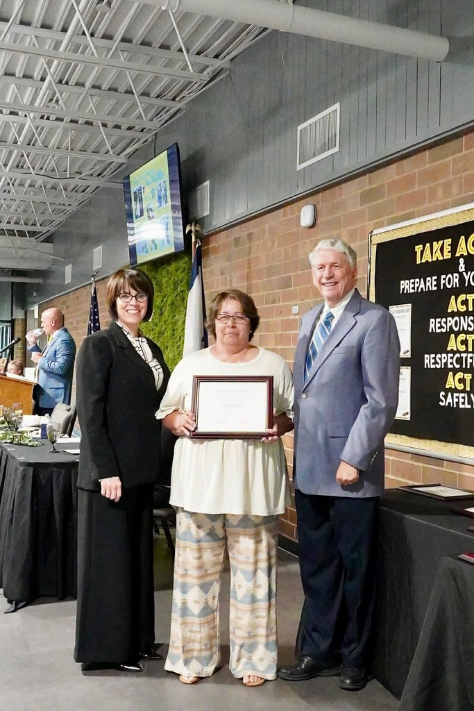 Tina getting her award. 