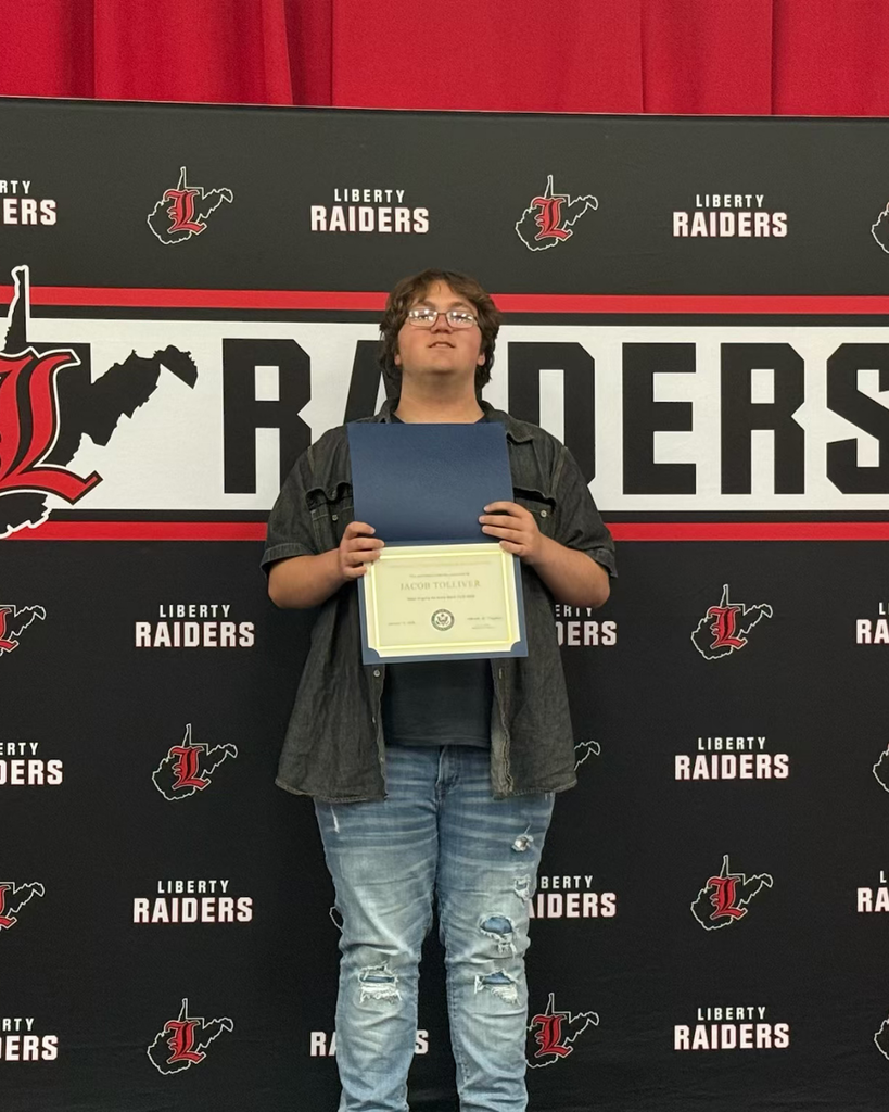 Jacob Tolliver received a Certificate of Congressional Recognition for being selected for West Virginia All State Band
