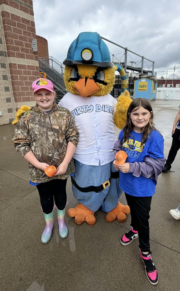 3rd Grade Students Addyson and Brooklyn with the Dirty Bird Mascot. 