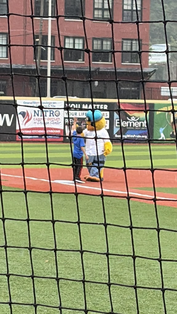 The Dirty Bird Mascot congratulating David on his win in the base race. 