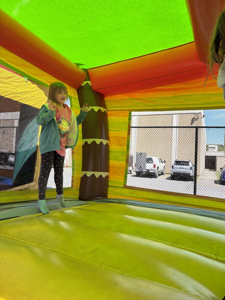 Kaelynn enjoying the bounce house after the main events. 