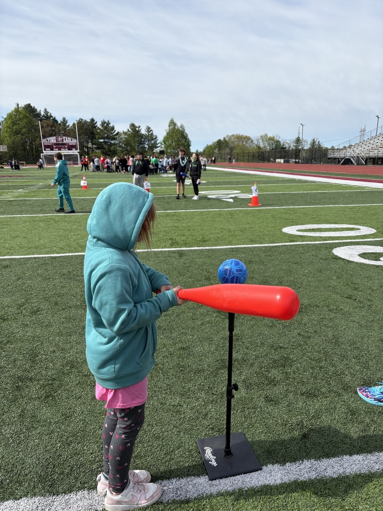 Kaelynn participating in the T-Ball Event. 