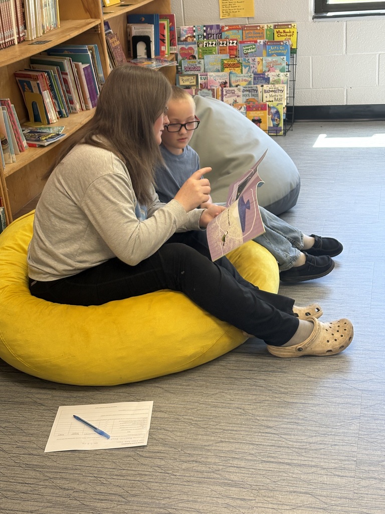Cubs reading to family members. 