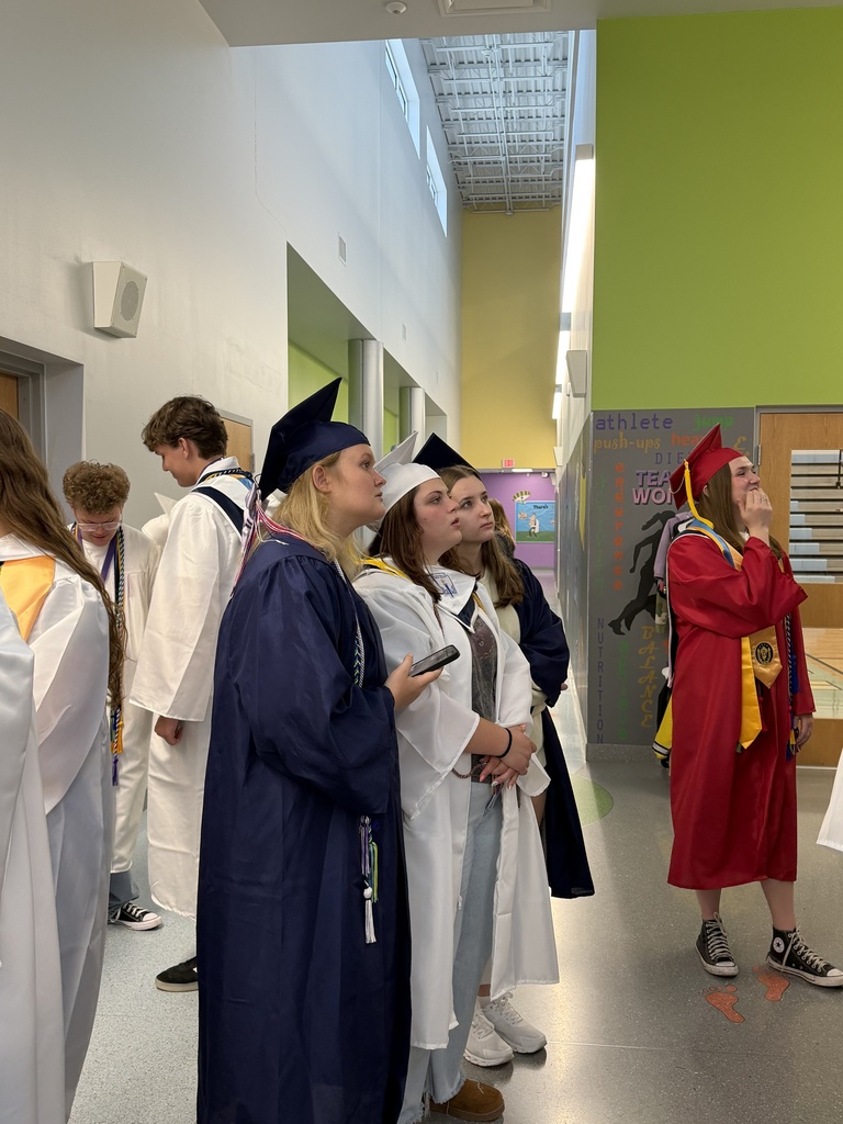 Graduates trying to locate their tile in the Ridgeview Mural