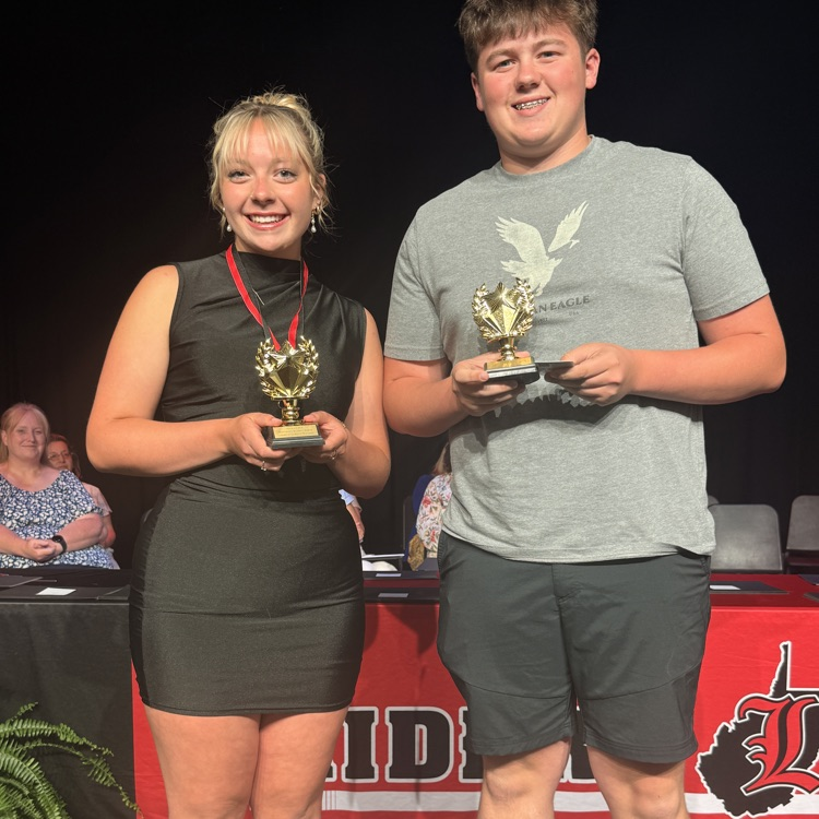 Ava and Caden with citizenship award