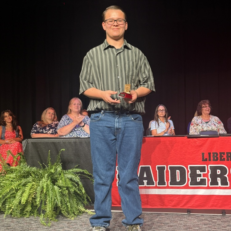 Steven receiving perfect attendance award