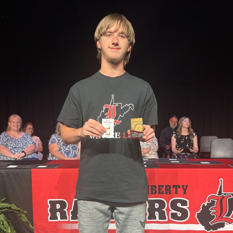 Eli receiving perfect attendance award