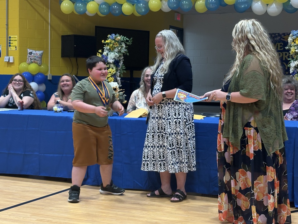 Cubs receiving their awards. 