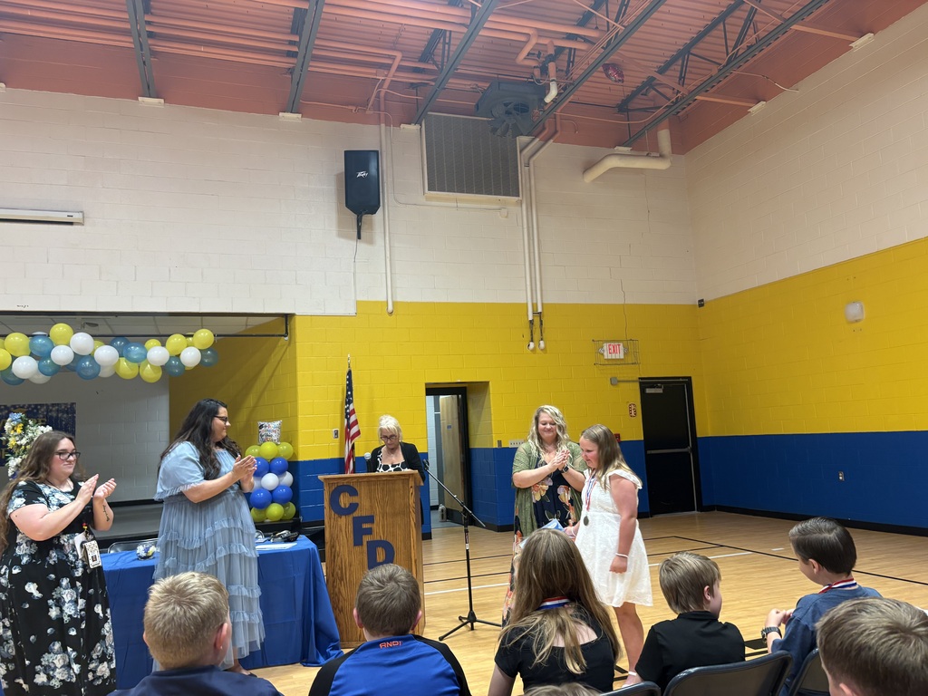 Cubs receiving their awards. 
