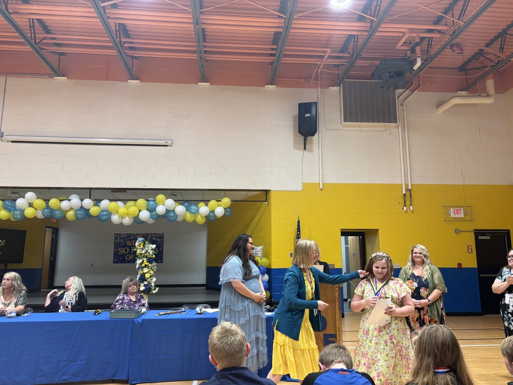 Cubs receiving their awards. 