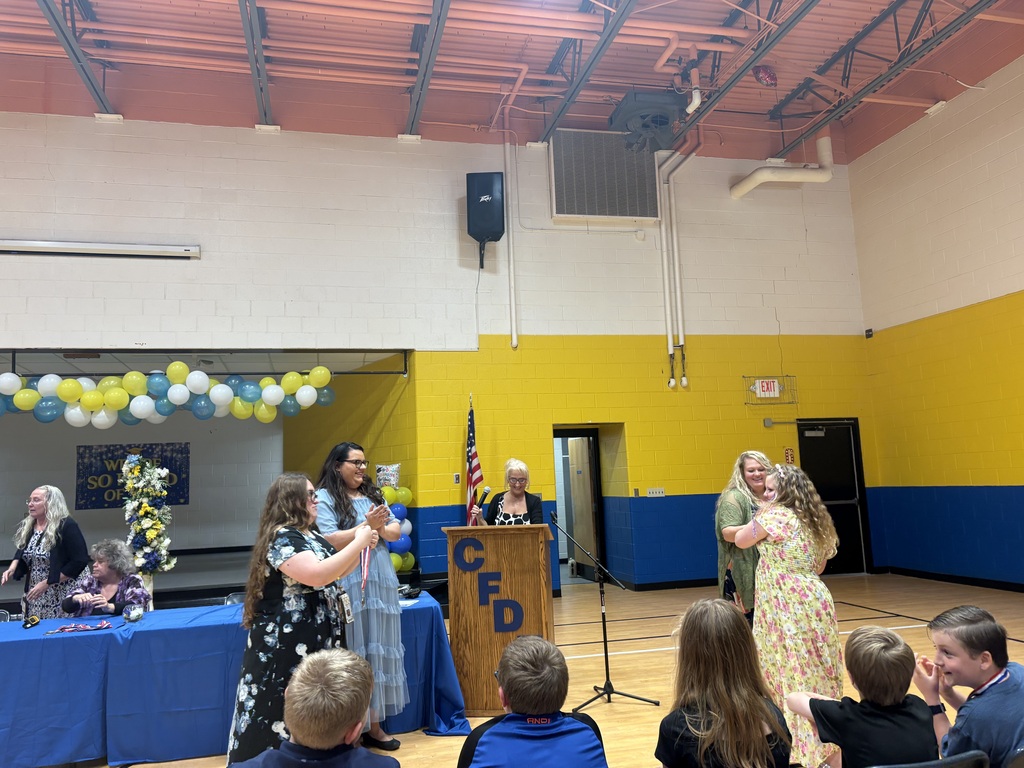 Cubs receiving their awards. 