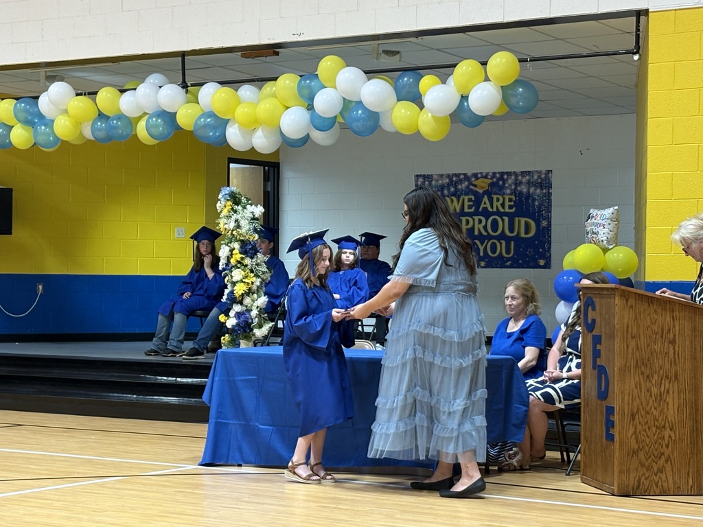 Cubs receiving their awards. 