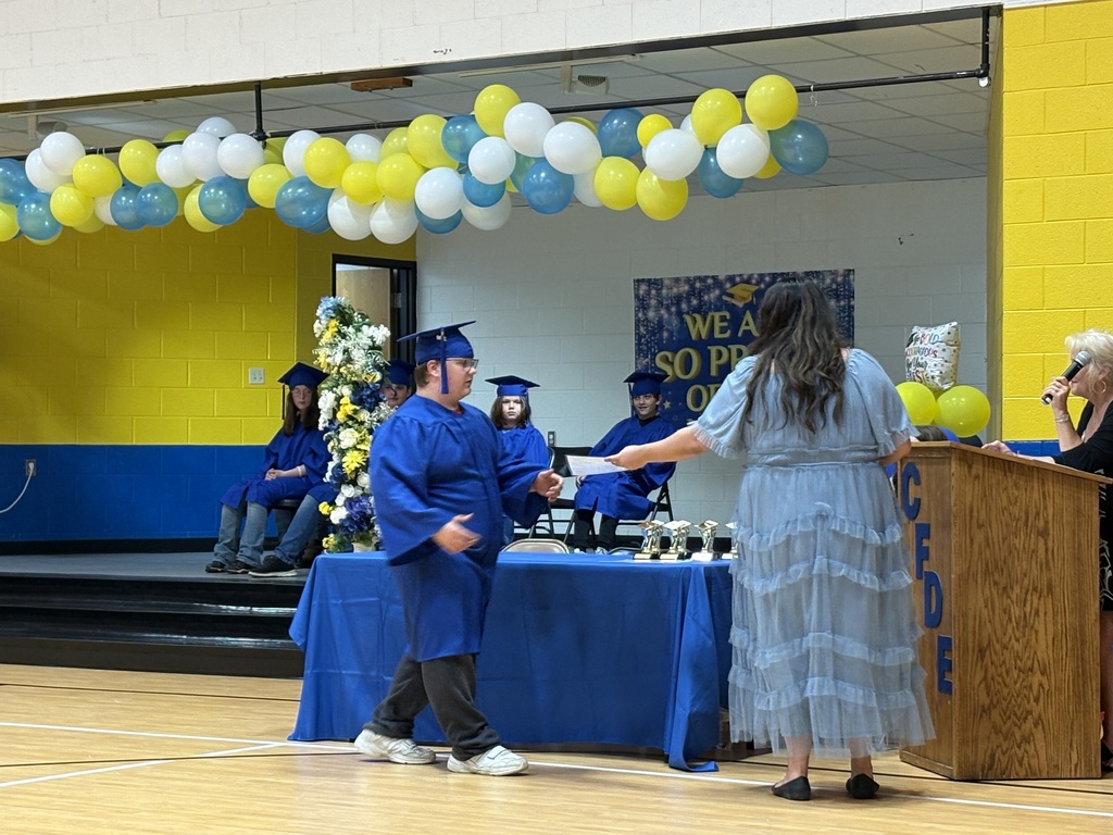 Cubs receiving their awards. 