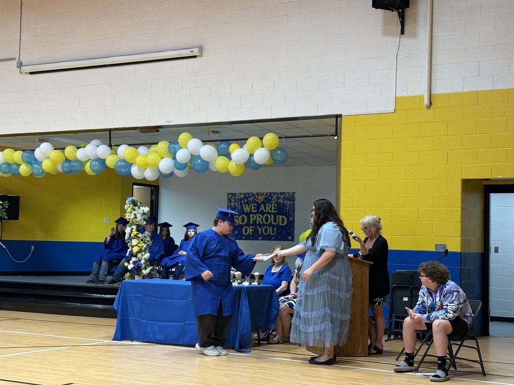 Cubs receiving their awards. 