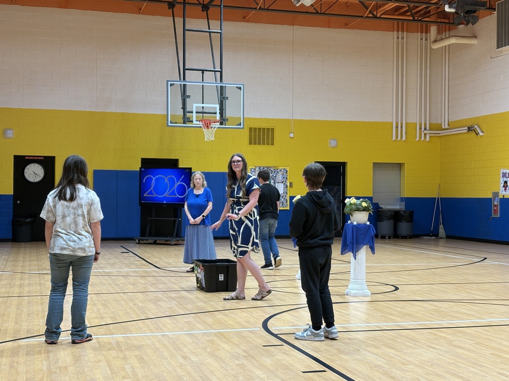 5th grade performing a skit for graduation.