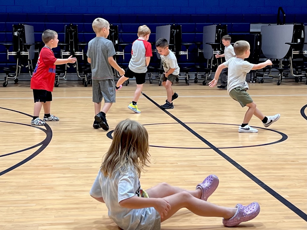 Students playing Freeze Dance in Gym.