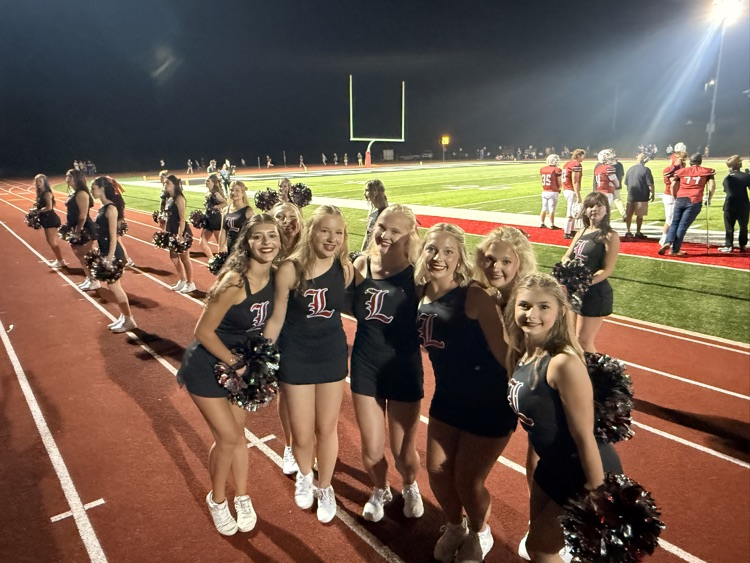 dance team on the track posing 