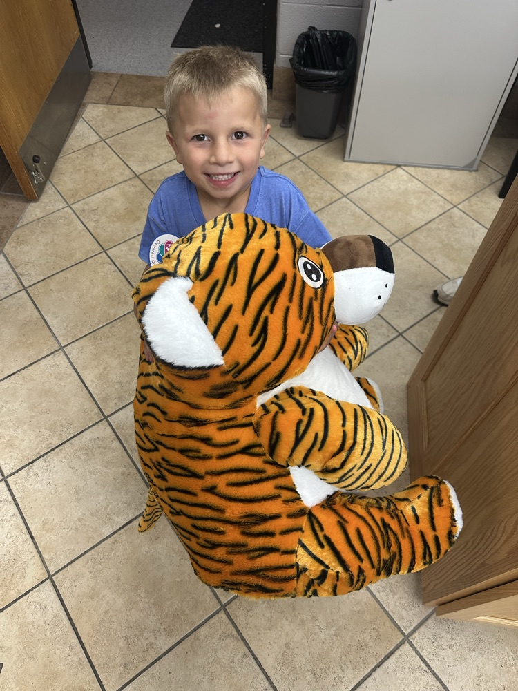 Jude with a stuffed tiger