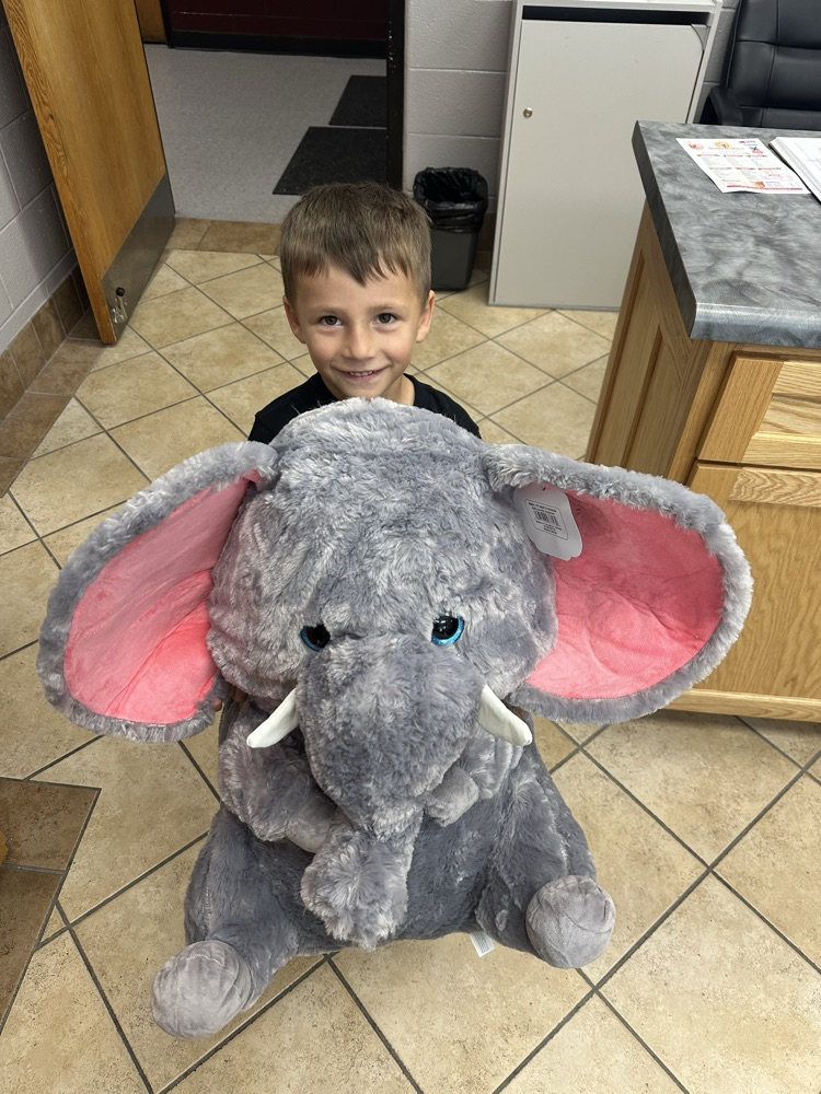 briar with a stuffed elephant