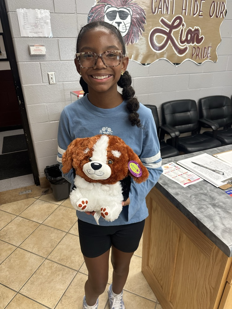 nya with a stuffed dog