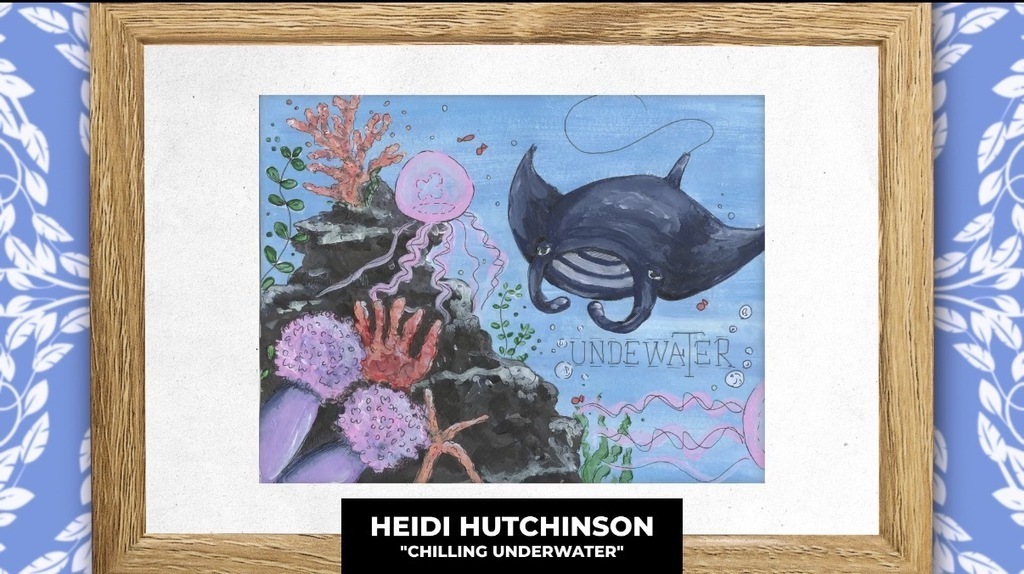 A framed artwork depicts an underwater scene with coral reefs, starfish, and a manta ray. The background is blue with a white pattern.