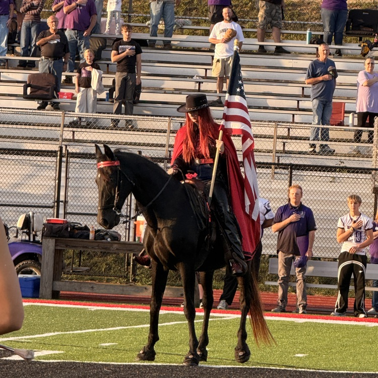 horse with student and American flag
