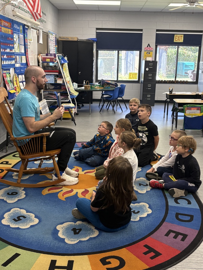 WV Dancers reading a story to 1st grade about emotions. 