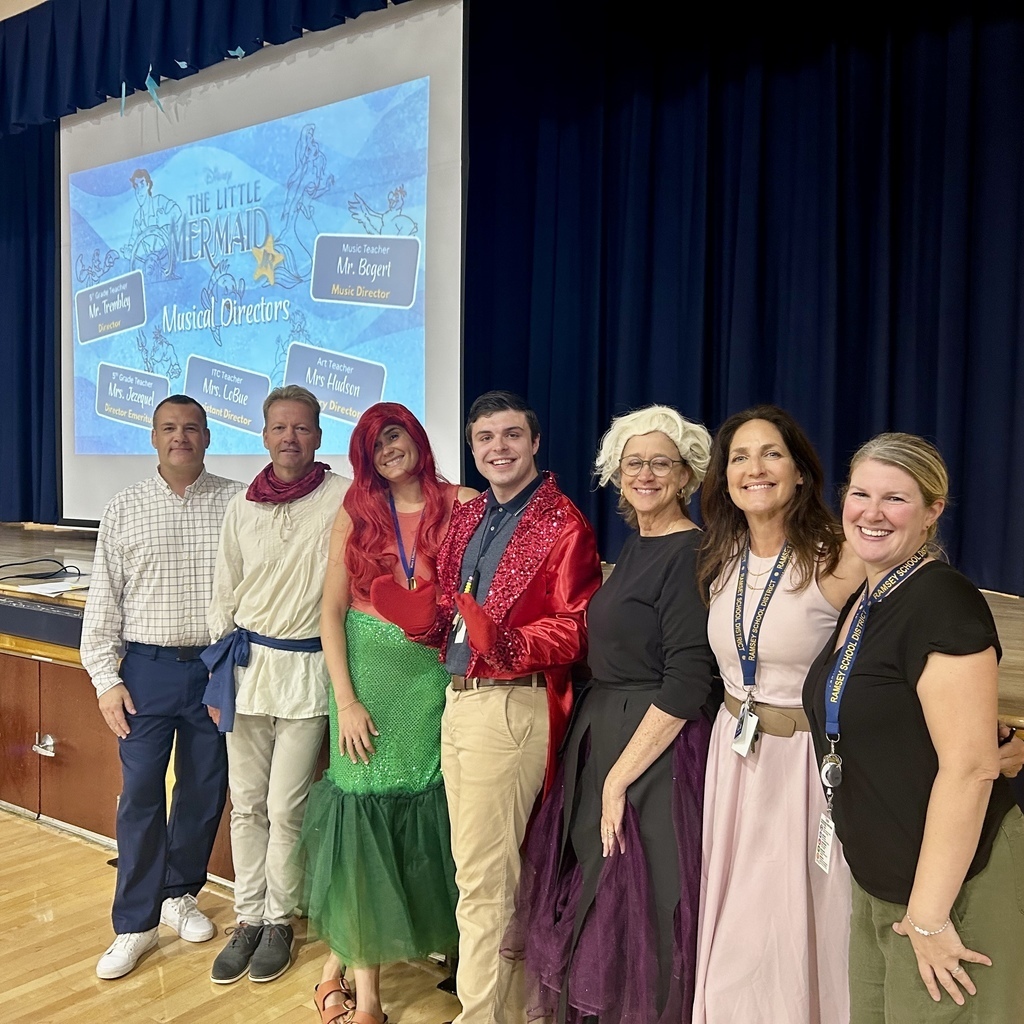 faculty members dressed as characters from little mermaid