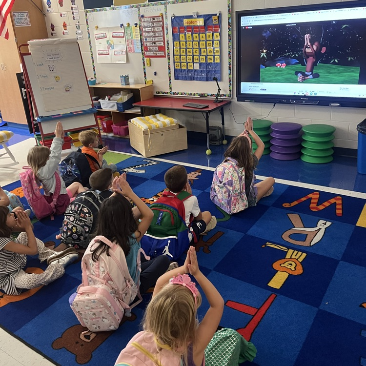 Kindergarten students at Tisdale are practicing regulating their emotions through Monkey Meditation before getting ready for dismissal!