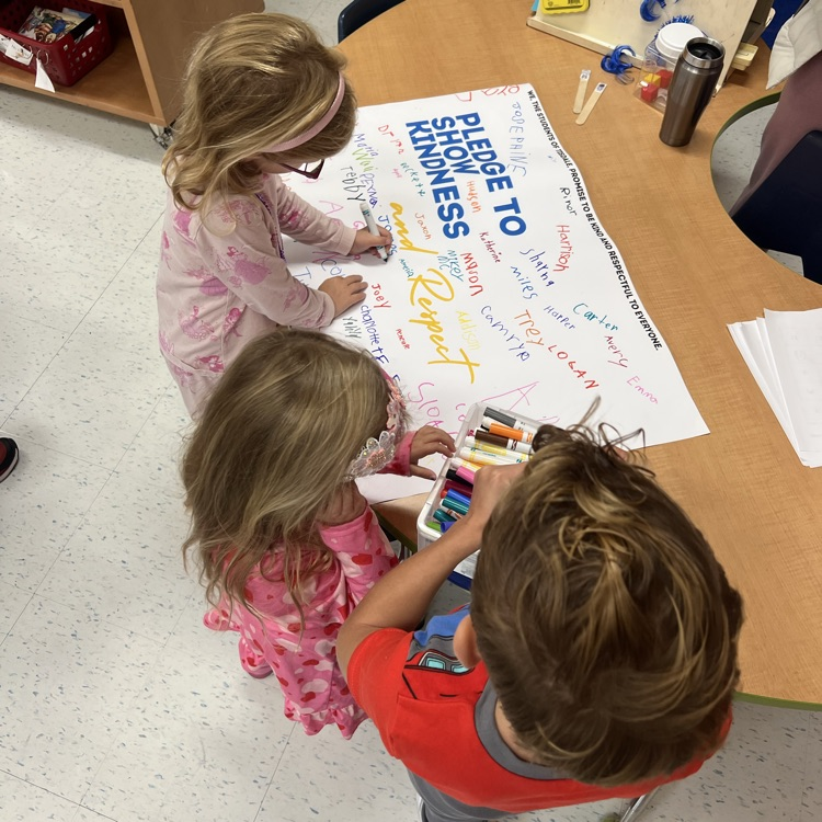 Spreading kindness one signature at a time! π Ms. Collado reminds our Tisdale students that kindness starts with us and had our kindergarten students in KP sign the Kindness Pledge to continue to promote positivity and build strong friendships!