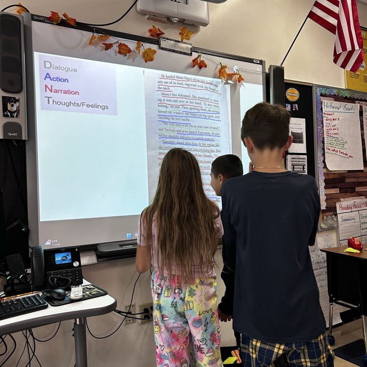 students are collaborating in Miss Gulino’s humanities class using the strategy dance in order to notice import components in historical writing piece. 