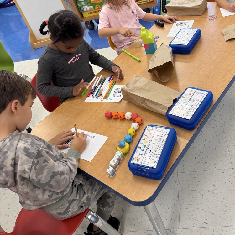 Kindergarten mathematicians in action! ππ’ Students created mystery bags with objects from home to practice counting, drawing to represent quantities, and writing numbers to show their thinking!