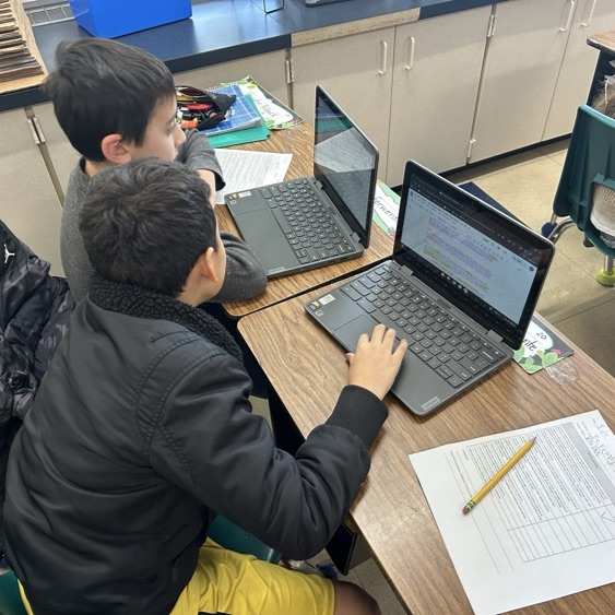 Students in 5Johnstone participate in peer reviews for their Historical Fiction process pieces!