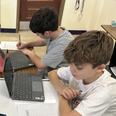 Students in 5Johnstone participate in peer reviews for their Historical Fiction process pieces!