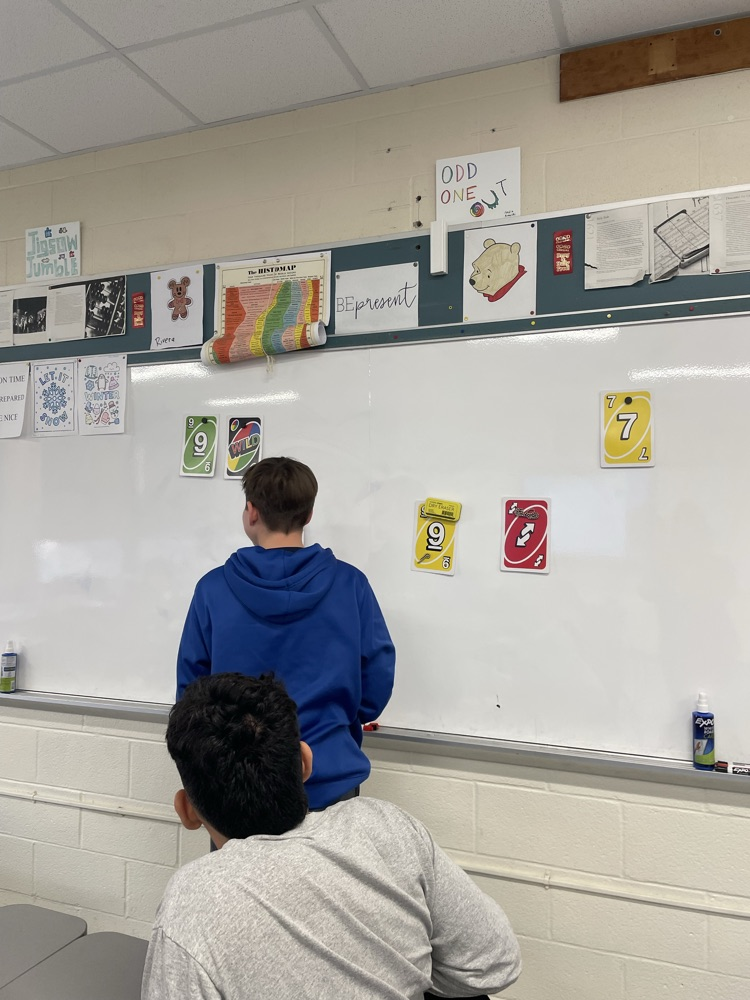 Alex Kopec uses Uno cards to demonstrate a proof.