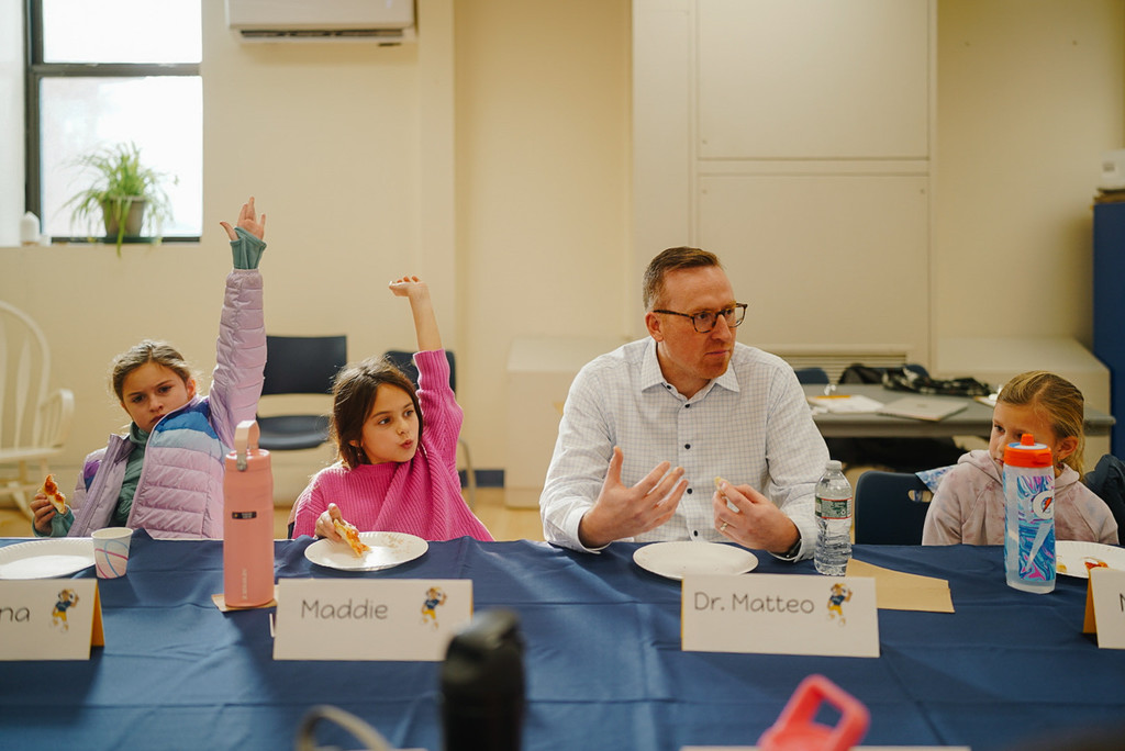 Superintendent with students