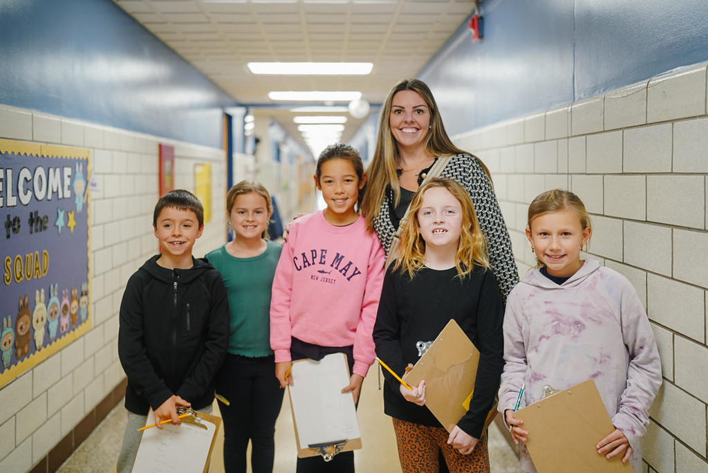 Principal with students