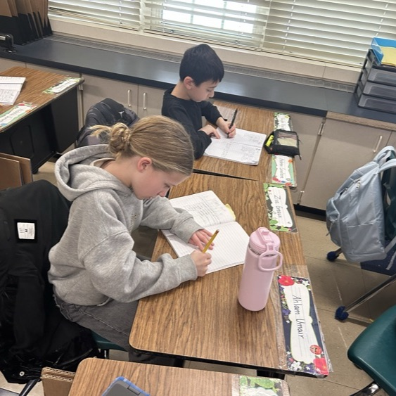 Students in 5Jo work together to create new words using 4 Greek and Latin roots.